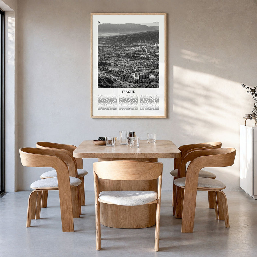 Ibagué Newspaper Poster in a natural wood frame, hanging in a dining room