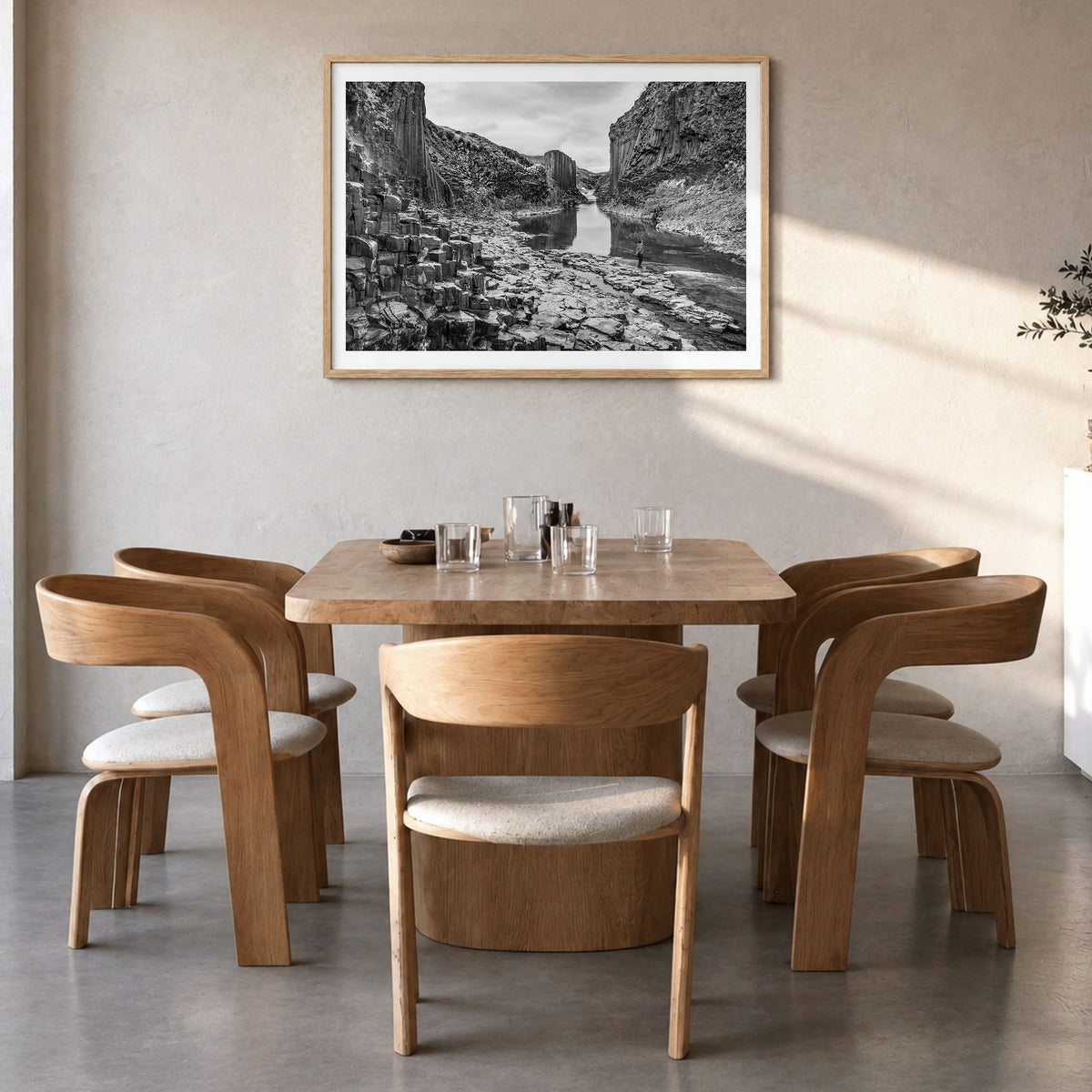 Iceland Photo Poster in a natural wood frame, hanging in a dining room, white border