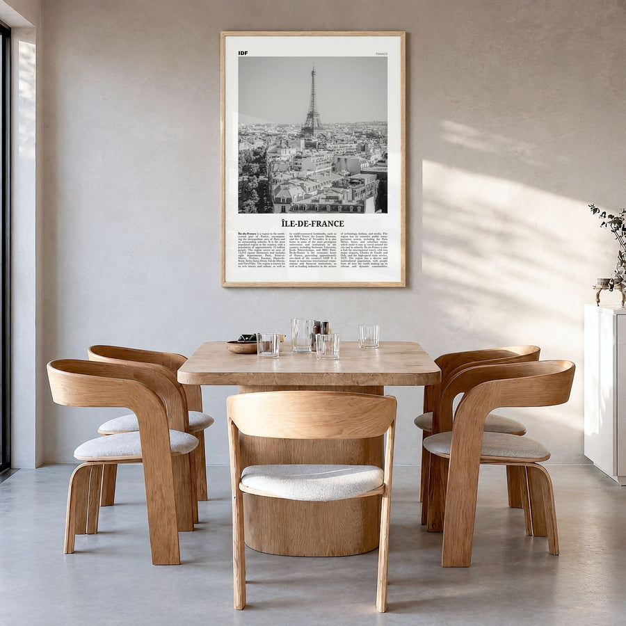 Île-de-France Newspaper Poster in a natural wood frame, hanging in a dining room