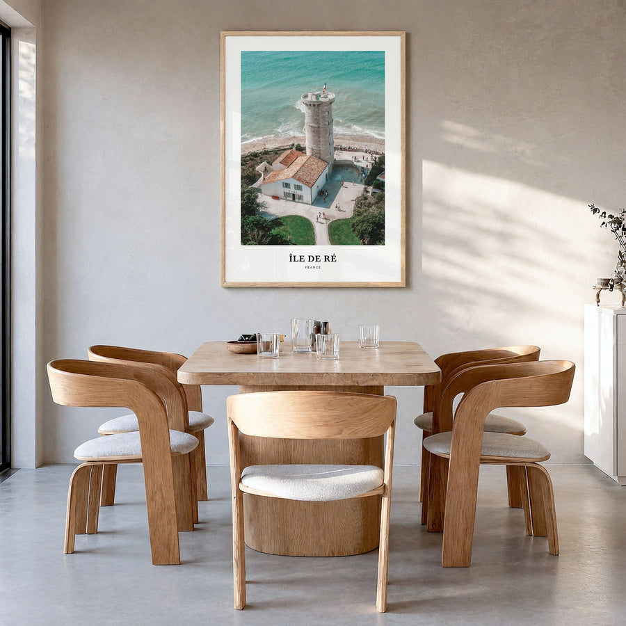 Île de Ré Classic Poster in a natural wood frame, hanging in a dining room