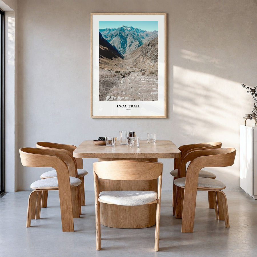 Inca Trail Classic Poster in a natural wood frame, hanging in a dining room