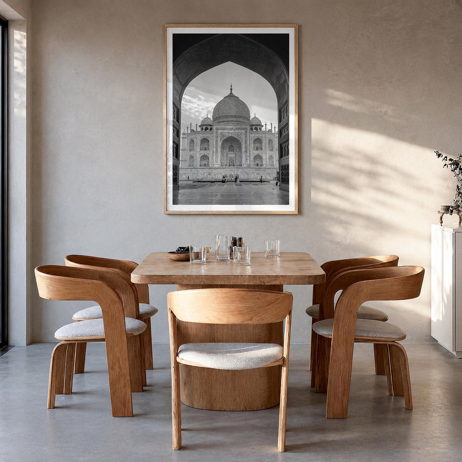 India black & white photo poster of Asia – vertical wall art in natural wood frame with white border, hanging on wall
