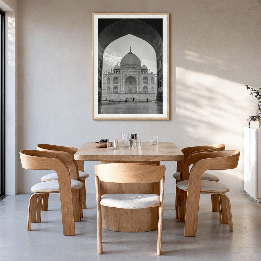 India Photo Poster in a natural wood frame, hanging in a dining room, white border