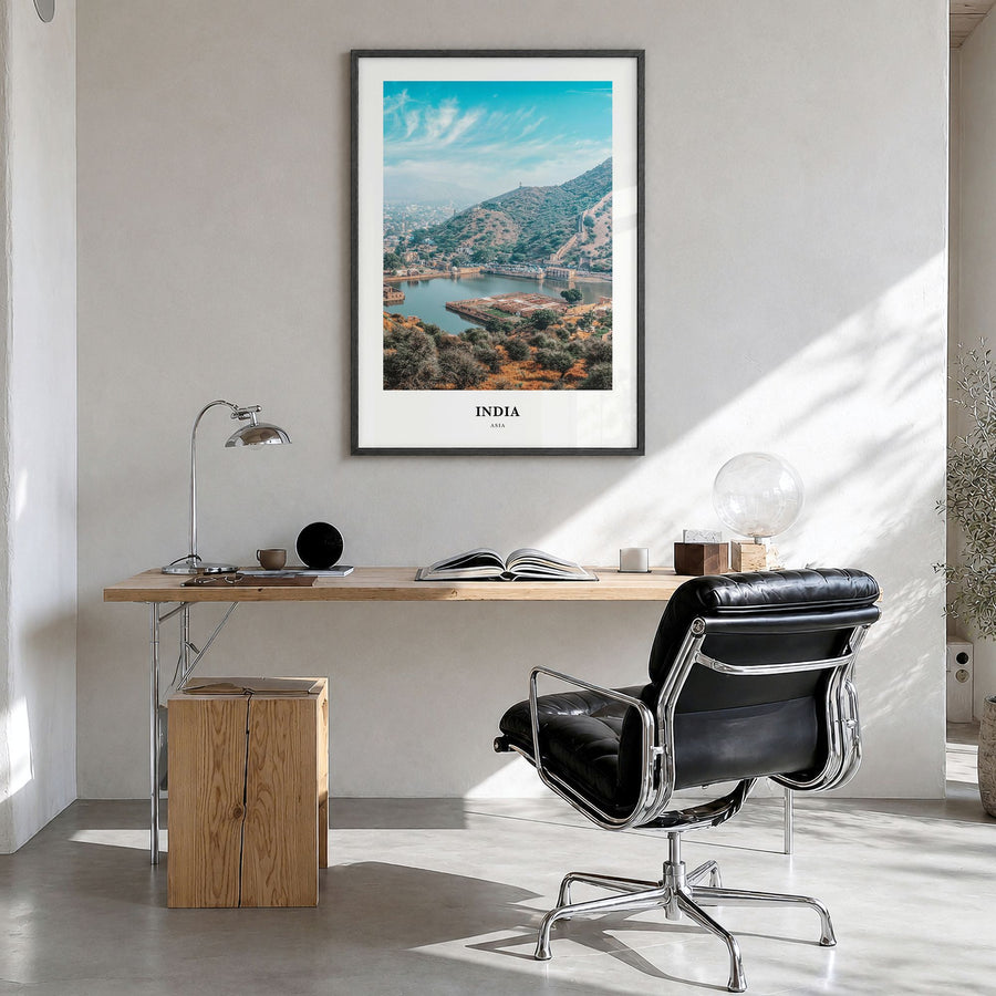 India Classic Poster in a black wood frame, hanging in a bright home office