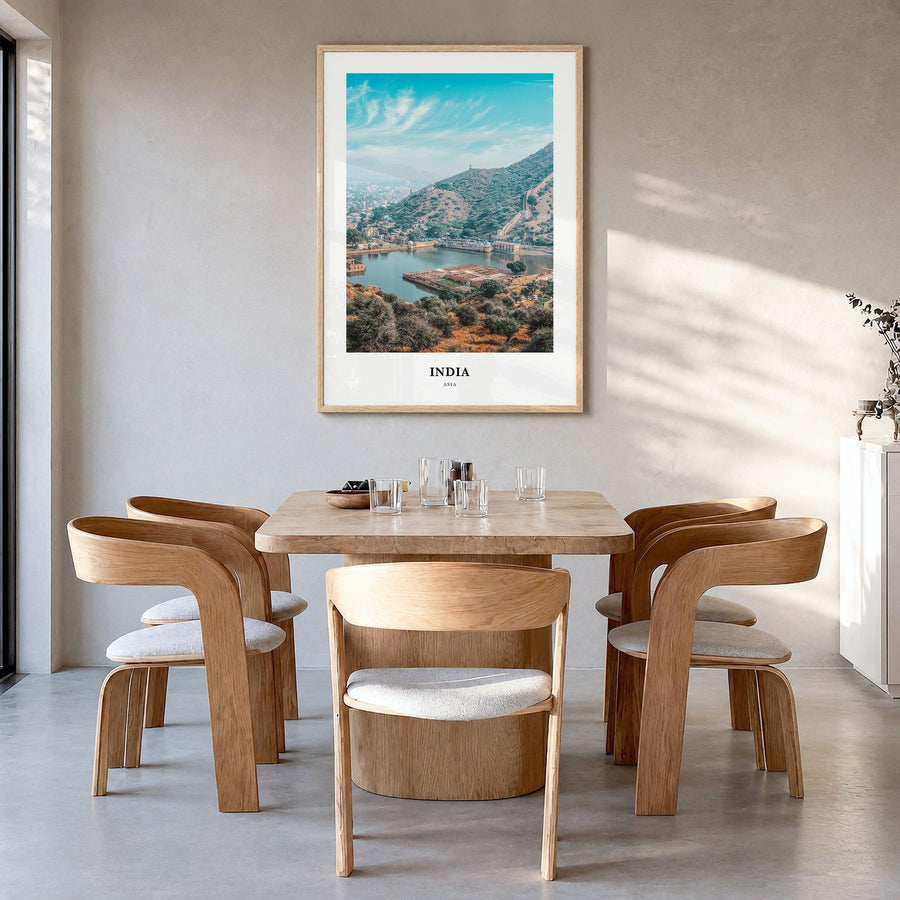 India Classic Poster in a natural wood frame, hanging in a dining room