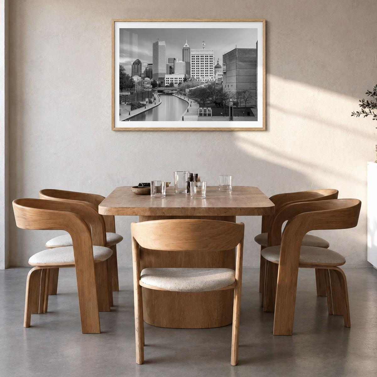 Indianapolis Photo Poster in a natural wood frame, hanging in a dining room, white border