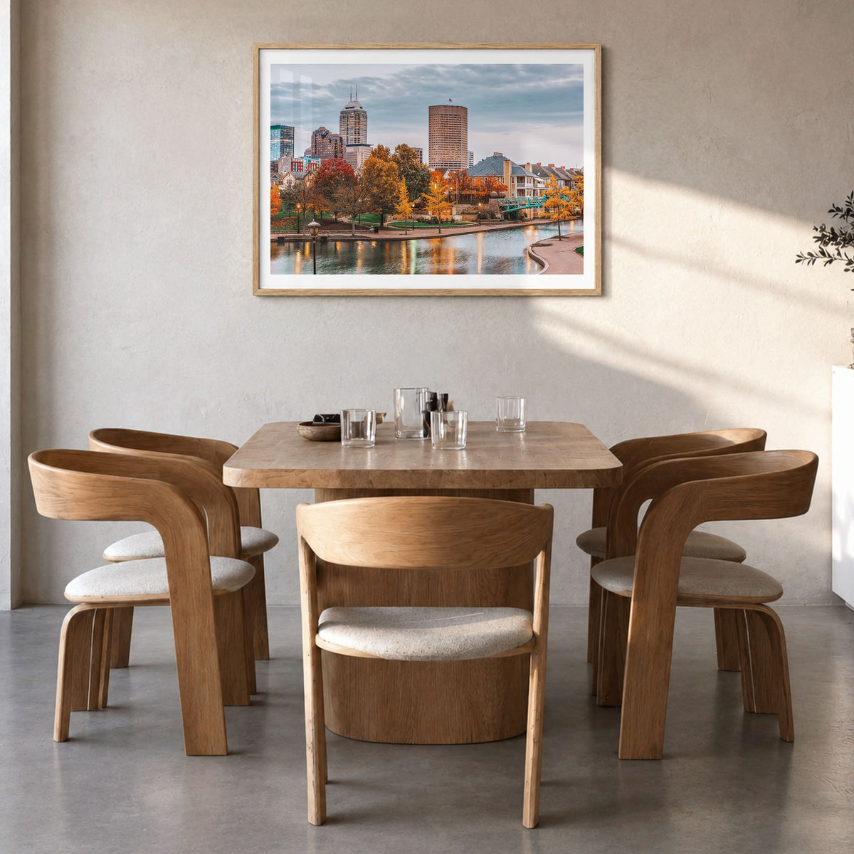 Indianapolis Photo Poster in a natural wood frame, hanging in a dining room, white border