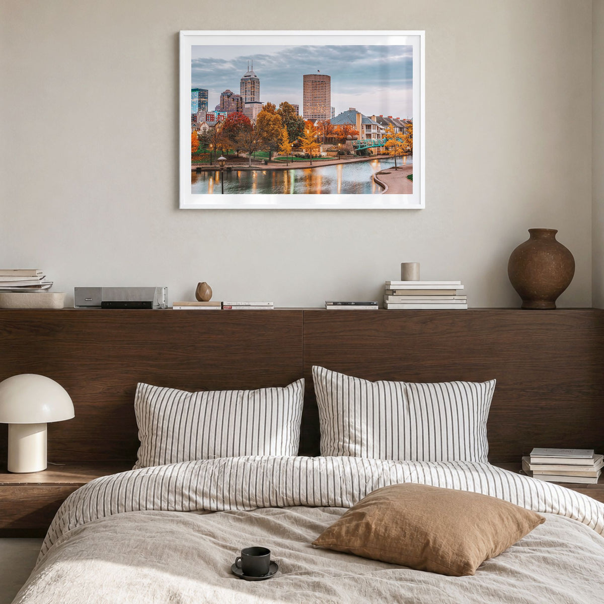 Indianapolis Photo Poster in a white wood frame, hanging in a bedroom, white border
