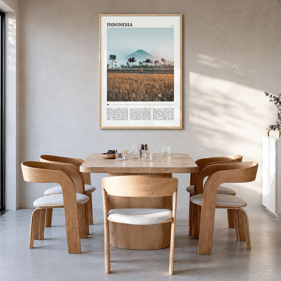 Indonesia Travel Poster in a natural wood frame, hanging in a dining room