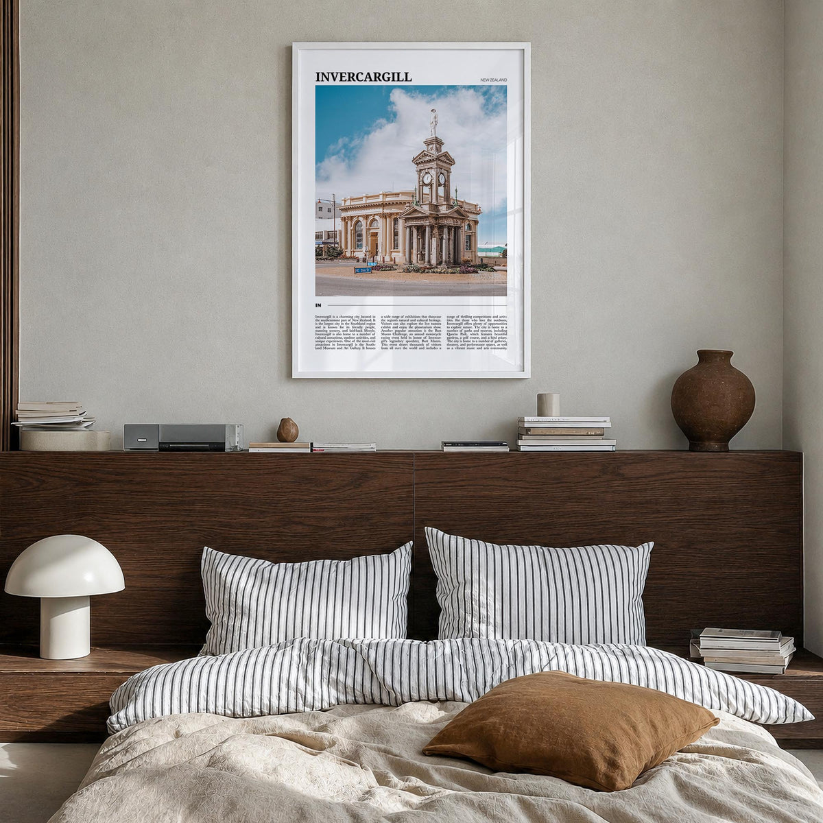 Invercargill colorful travel poster of New Zealand – vertical wall art in white wood frame, hanging on wall