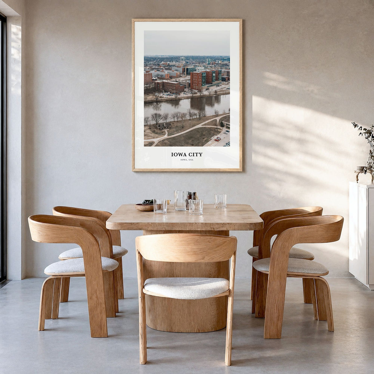 Iowa City Classic Poster in a natural wood frame, hanging in a dining room