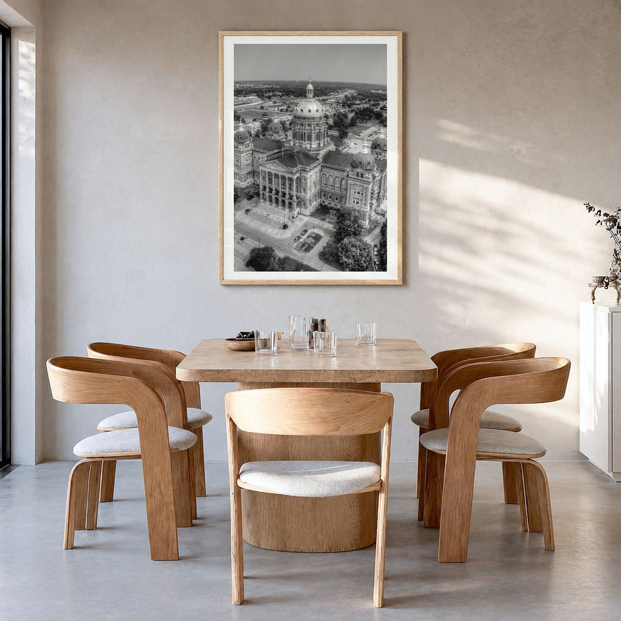 Iowa Photo Poster in a natural wood frame, hanging in a dining room, white border