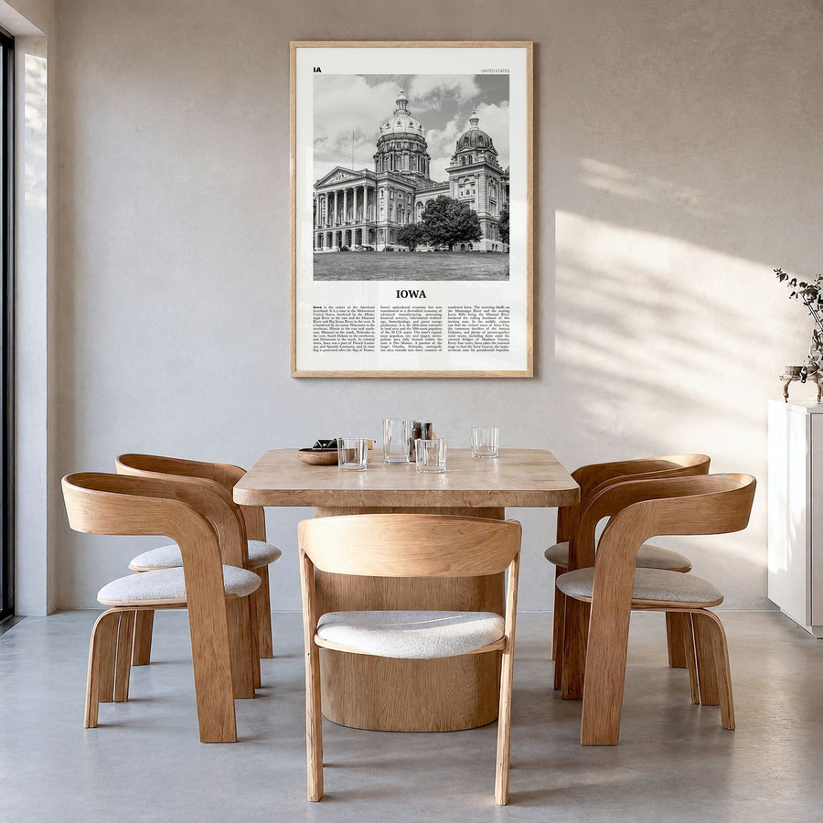 Iowa Newspaper No 2 Poster in a natural wood frame, hanging in a dining room