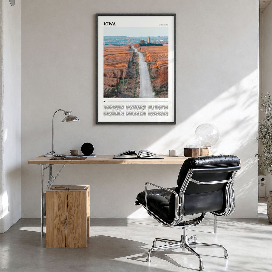 Iowa Travel Poster in a black wood frame, hanging in a bright home office