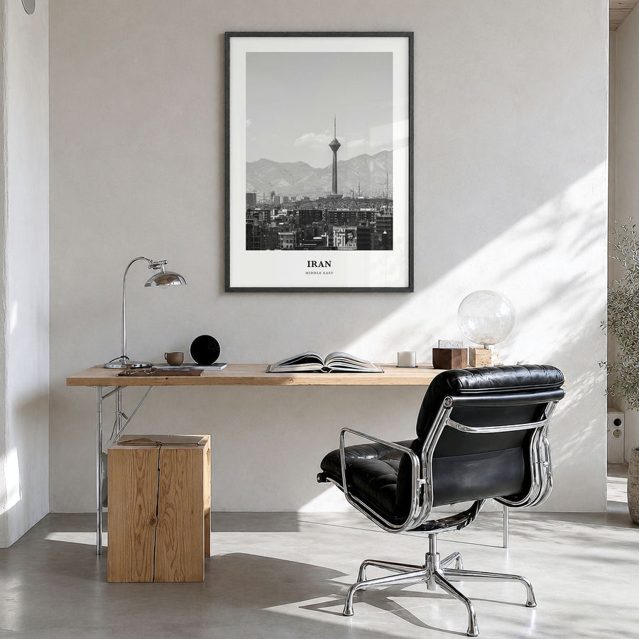 Iran Classic Poster in a black wood frame, hanging in a bright home office