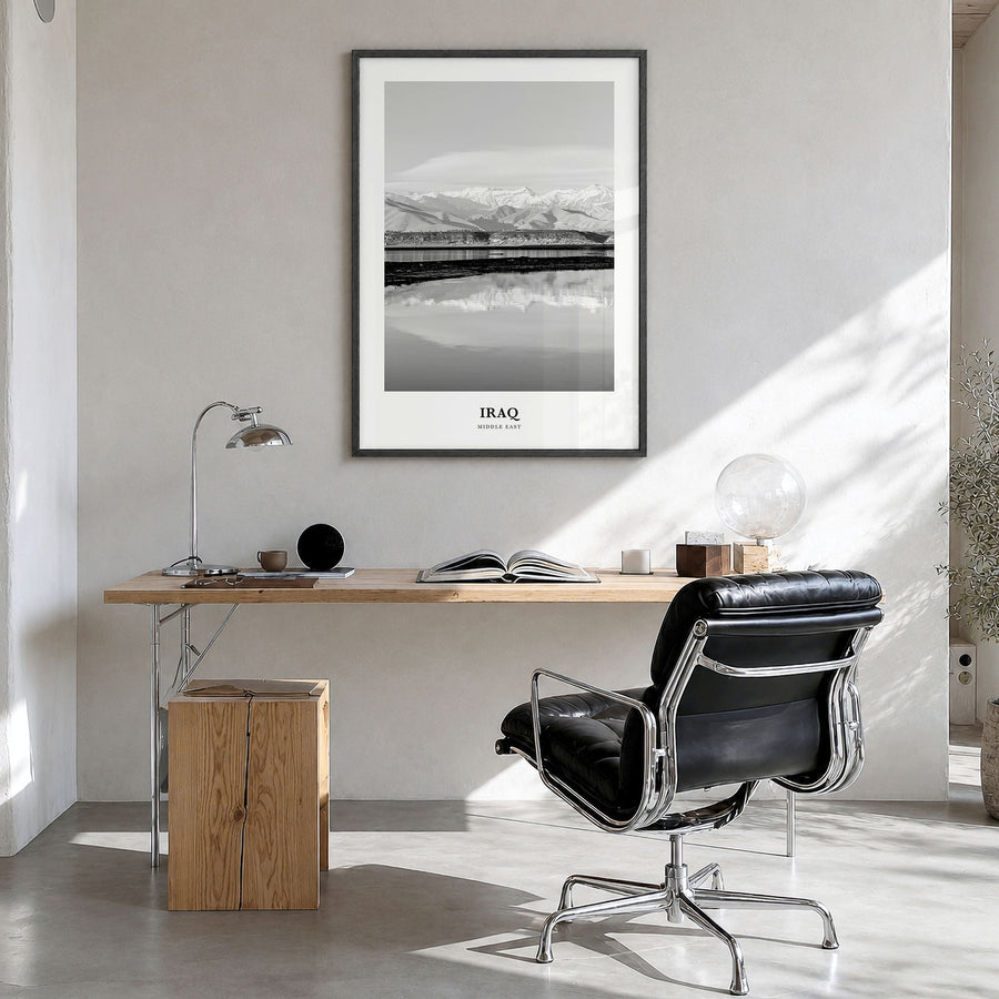 Iraq Classic Poster in a black wood frame, hanging in a bright home office