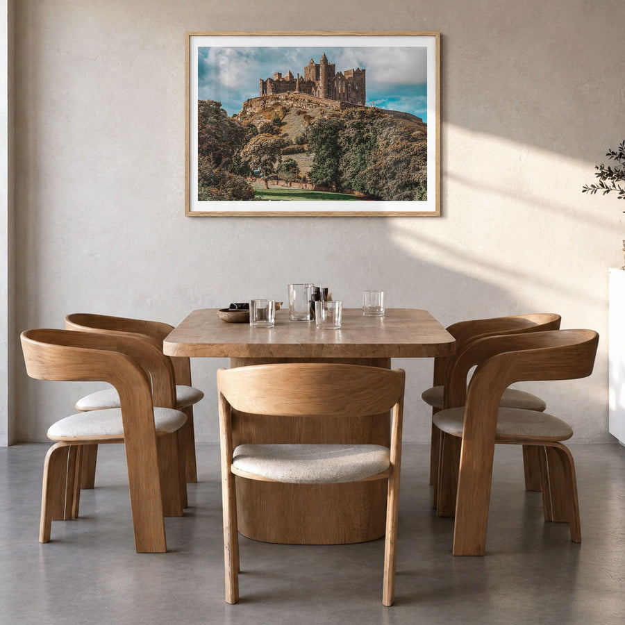Ireland Photo Poster in a natural wood frame, hanging in a dining room, white border