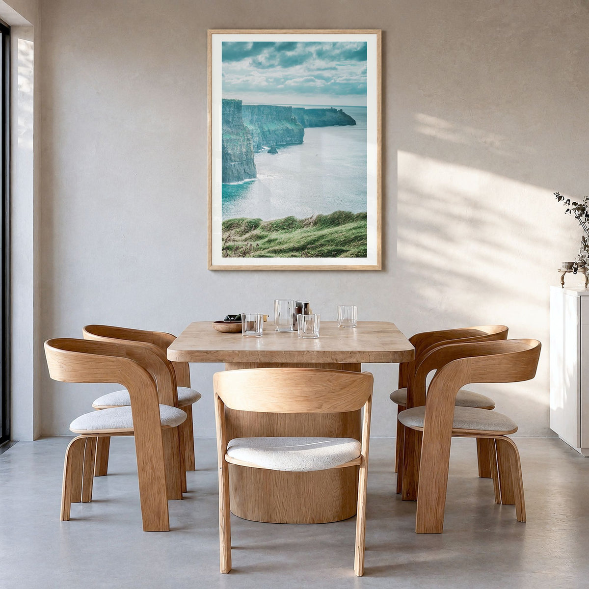 Ireland Photo No 1 Poster in a natural wood frame, hanging in a dining room, white border