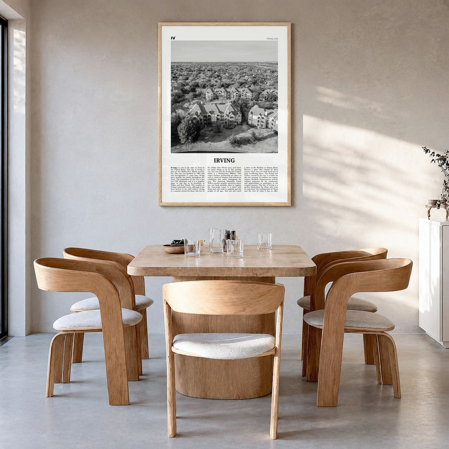 Irving Newspaper Poster in a natural wood frame, hanging in a dining room