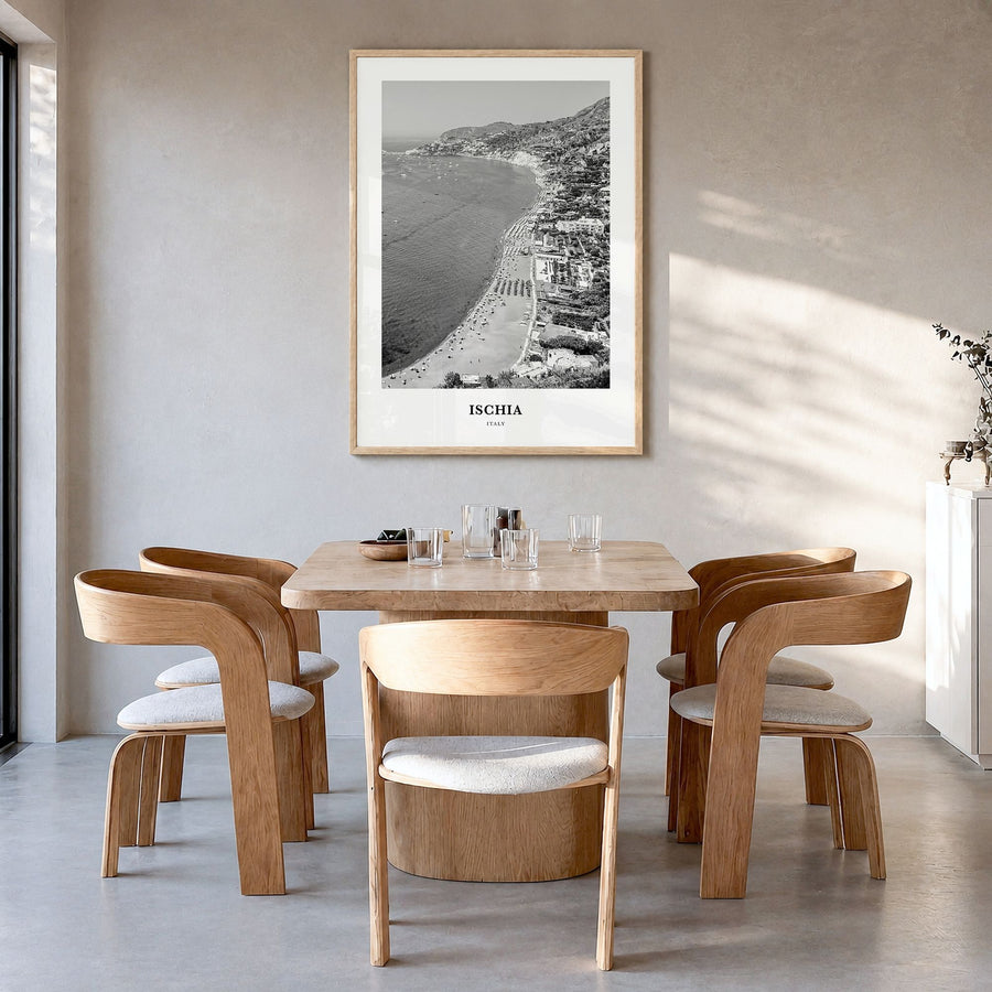 Ischia Classic Poster in a natural wood frame, hanging in a dining room