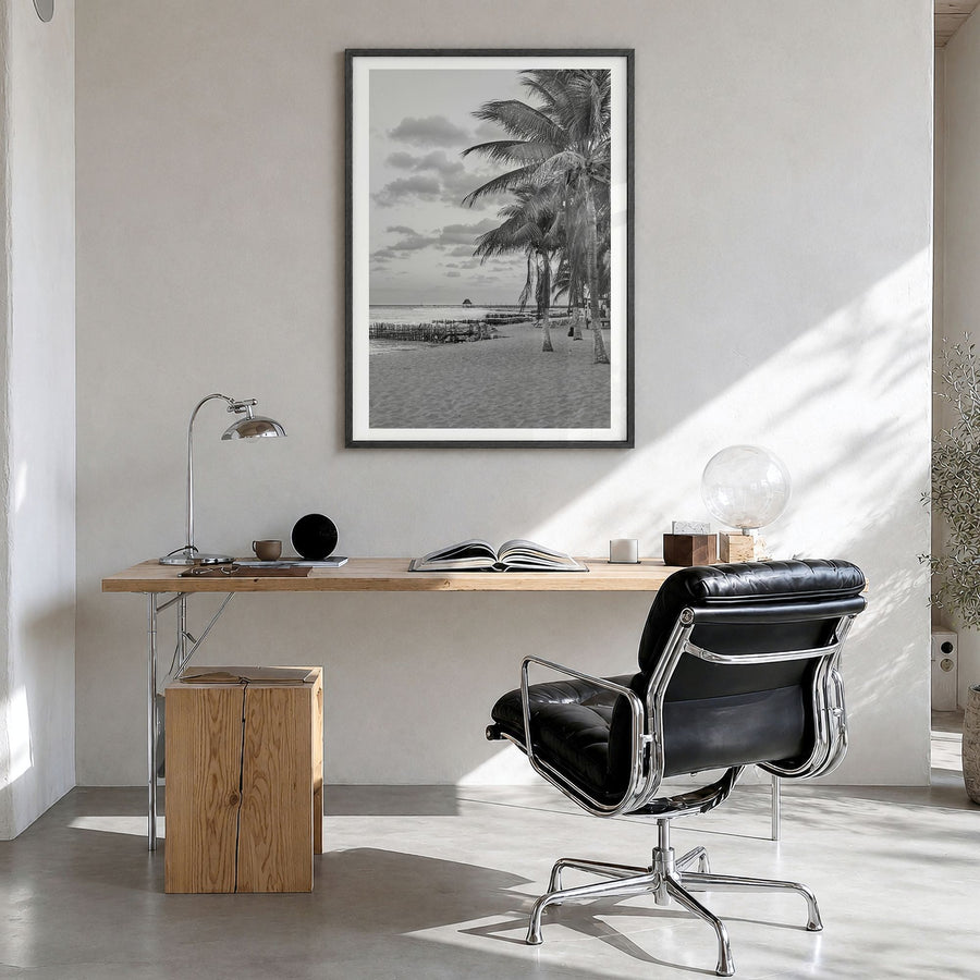 Isla Mujeres Photo Poster in a black wood frame, hanging in a bright home office, white border