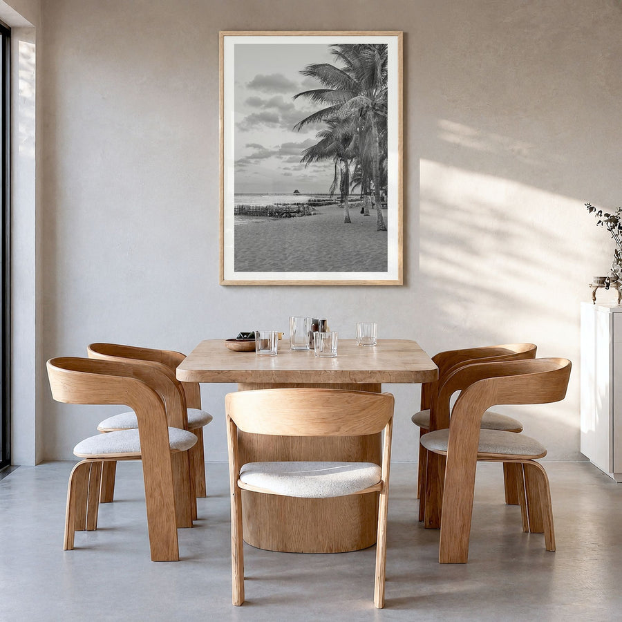 Isla Mujeres Photo Poster in a natural wood frame, hanging in a dining room, white border