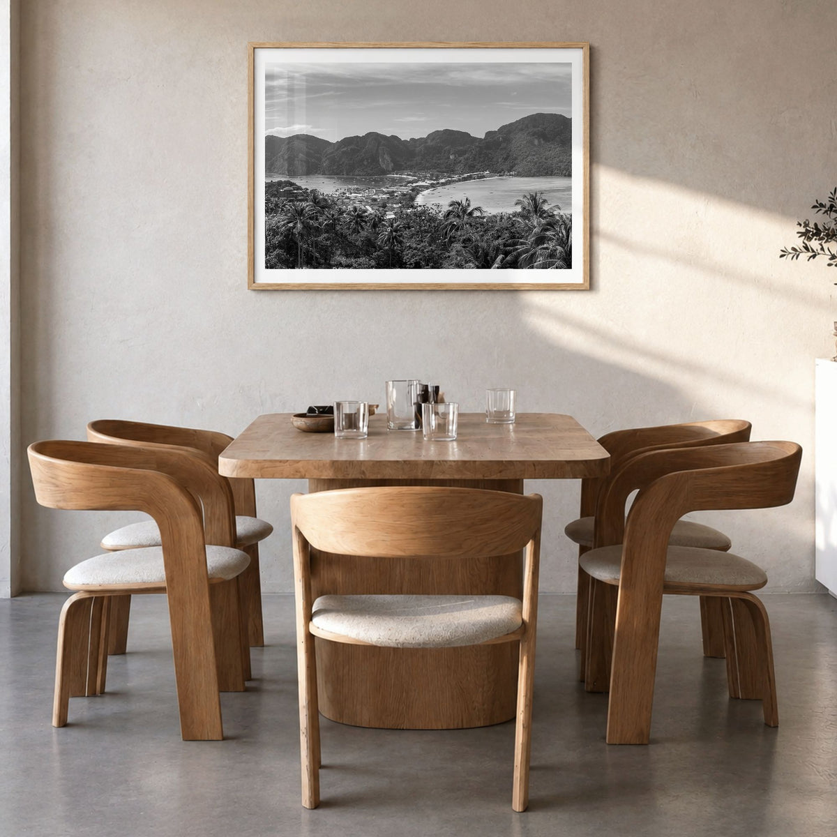 Isla Vista Photo Poster in a natural wood frame, hanging in a dining room, white border