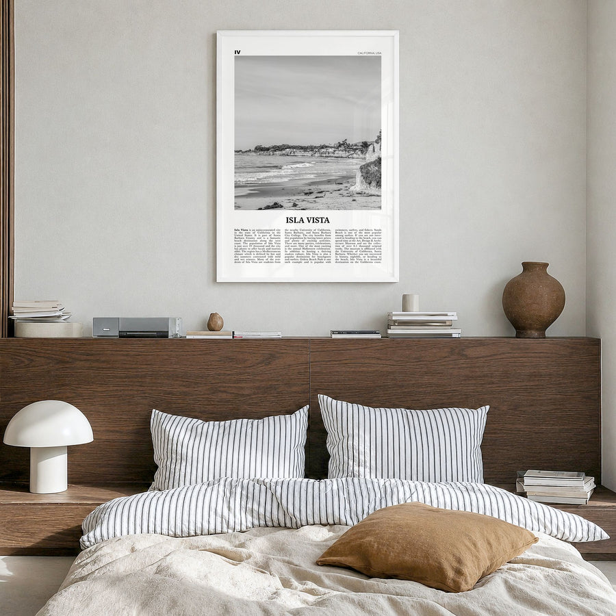 Isla Vista Newspaper Poster in a white wood frame, hanging in a bedroom