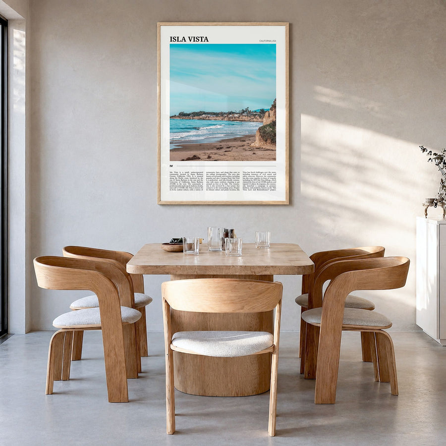 Isla Vista Travel Poster in a natural wood frame, hanging in a dining room
