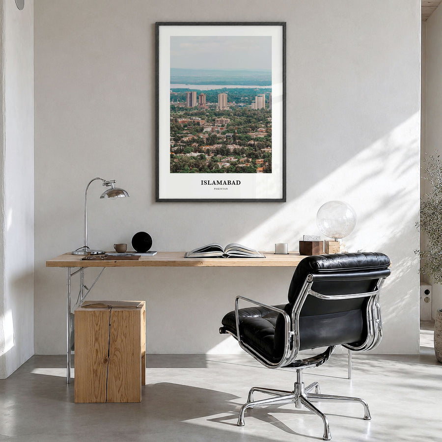 Islamabad Classic Poster in a black wood frame, hanging in a bright home office