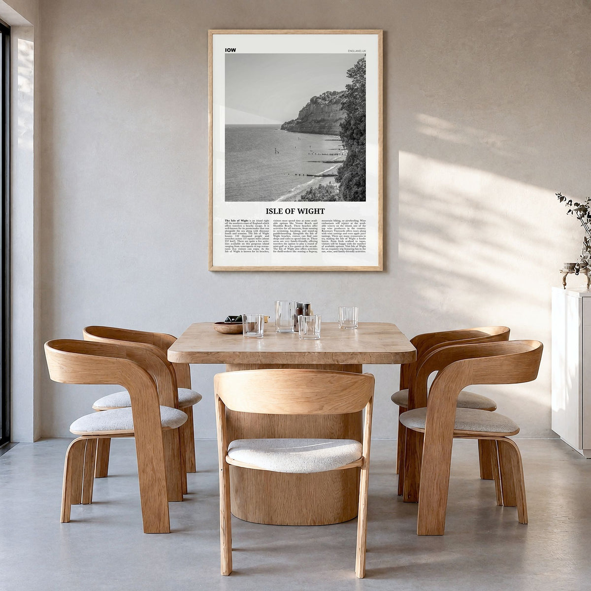 Isle of Wight Newspaper Poster in a natural wood frame, hanging in a dining room