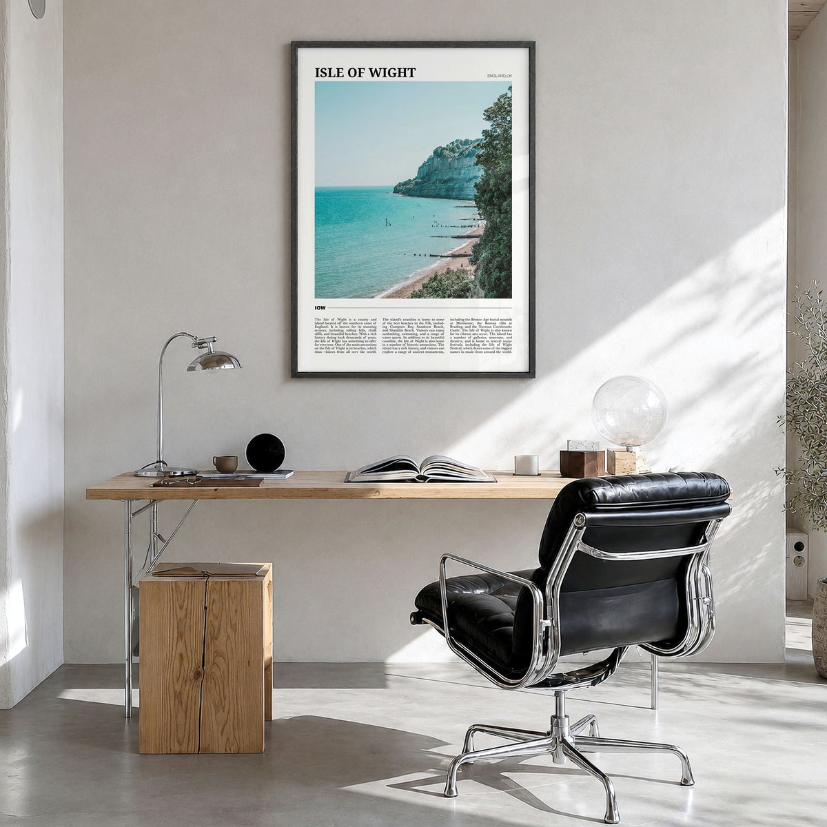 Isle of Wight Travel Poster in a black wood frame, hanging in a bright home office