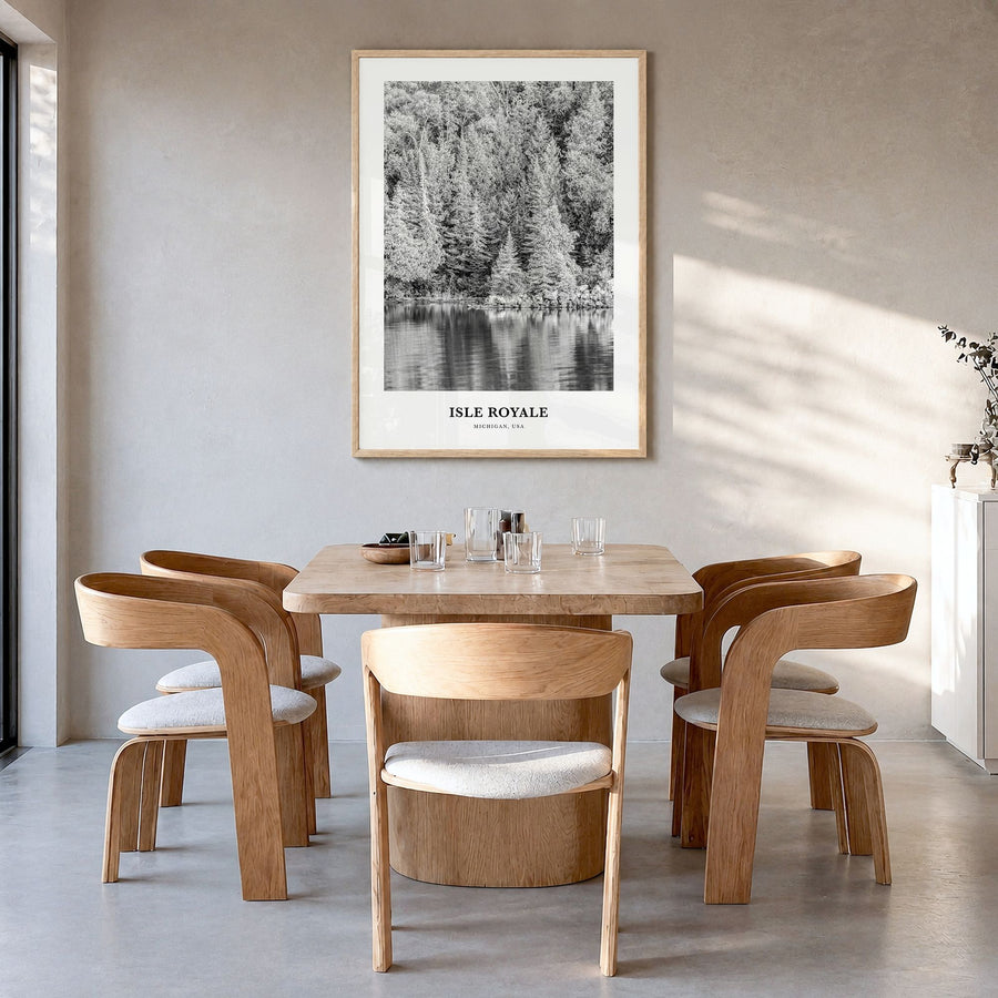 Isle Royale National Park Classic Poster in a natural wood frame, hanging in a dining room