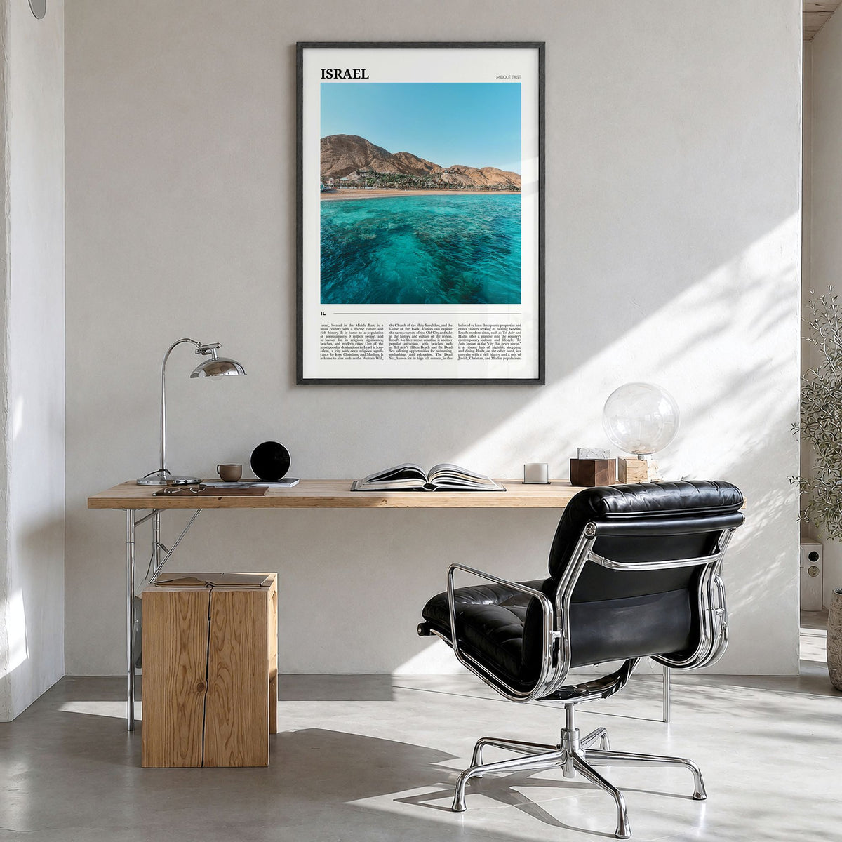 Israel Travel Poster in a black wood frame, hanging in a bright home office