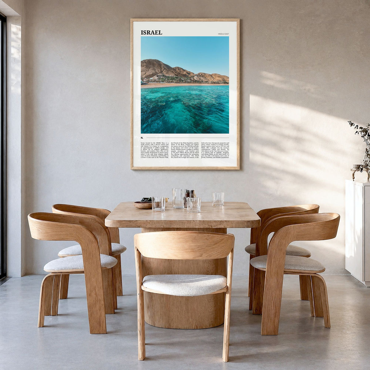 Israel Travel Poster in a natural wood frame, hanging in a dining room
