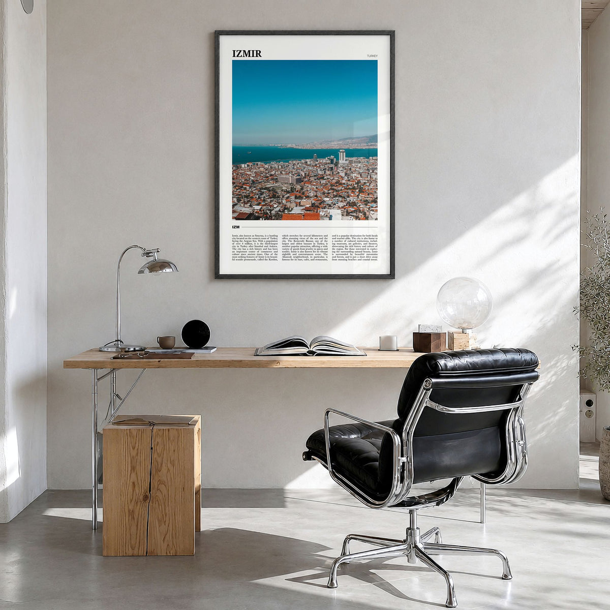 Izmir Travel Poster in a black wood frame, hanging in a bright home office