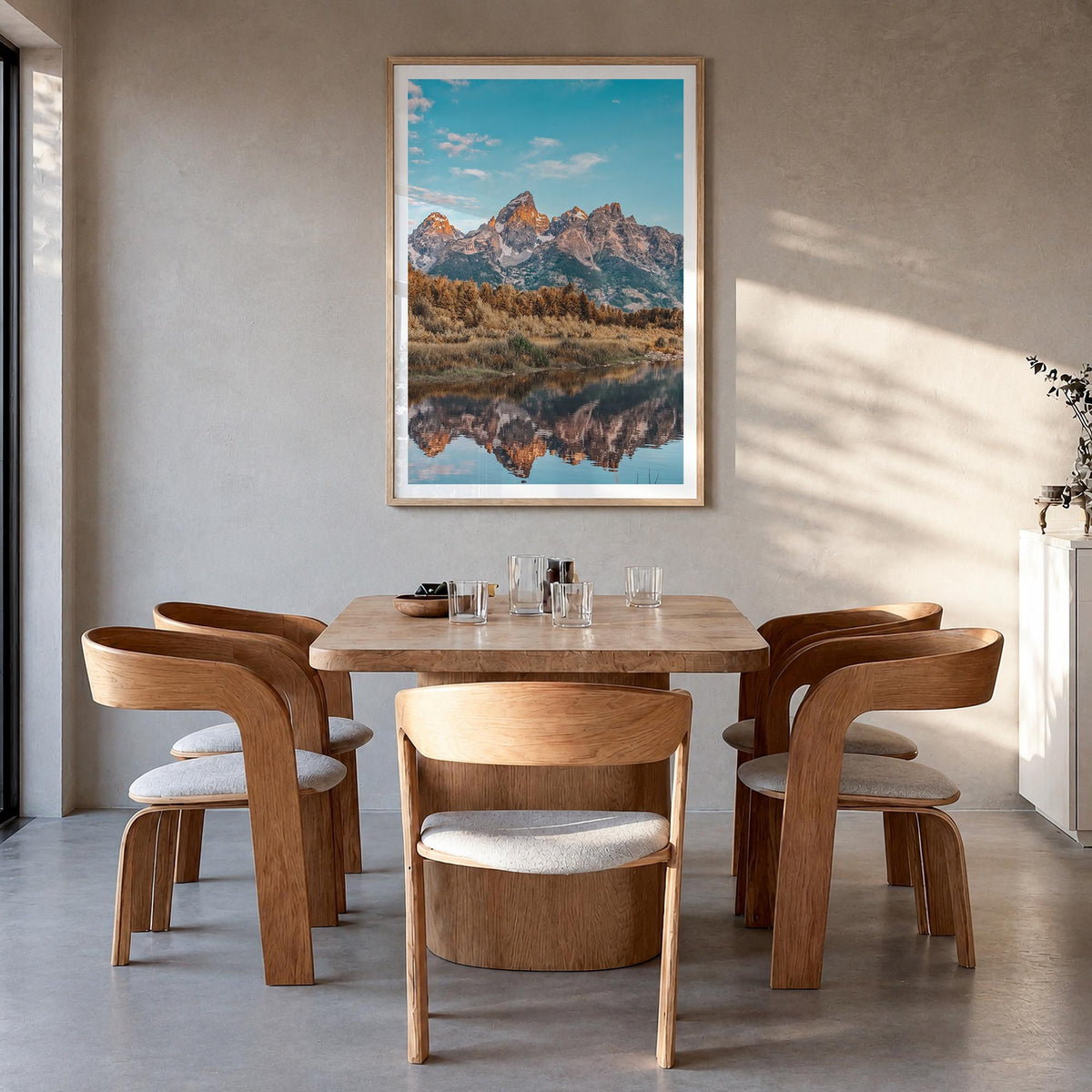 Jackson Hole colorful photo poster of Wyoming, USA – vertical wall art in natural wood frame with white border, hanging on wa