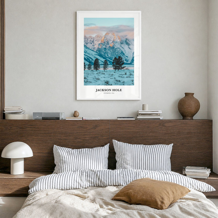 Jackson Hole Classic Poster in a white wood frame, hanging in a bedroom