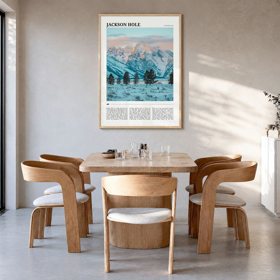 Jackson Hole Travel Poster in a natural wood frame, hanging in a dining room