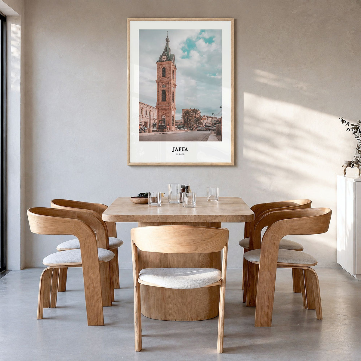 Jaffa Classic Poster in a natural wood frame, hanging in a dining room