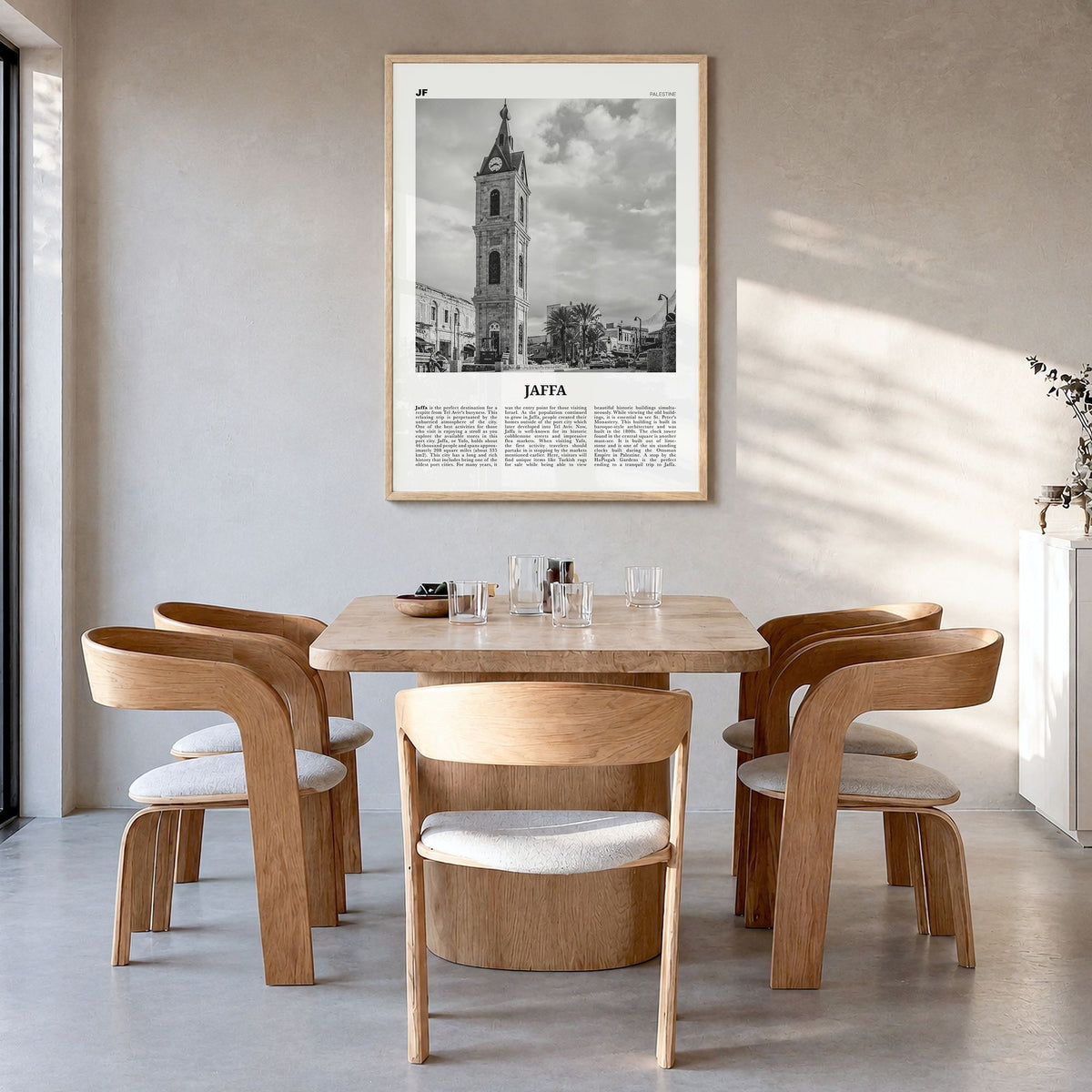 Jaffa Newspaper Poster in a natural wood frame, hanging in a dining room