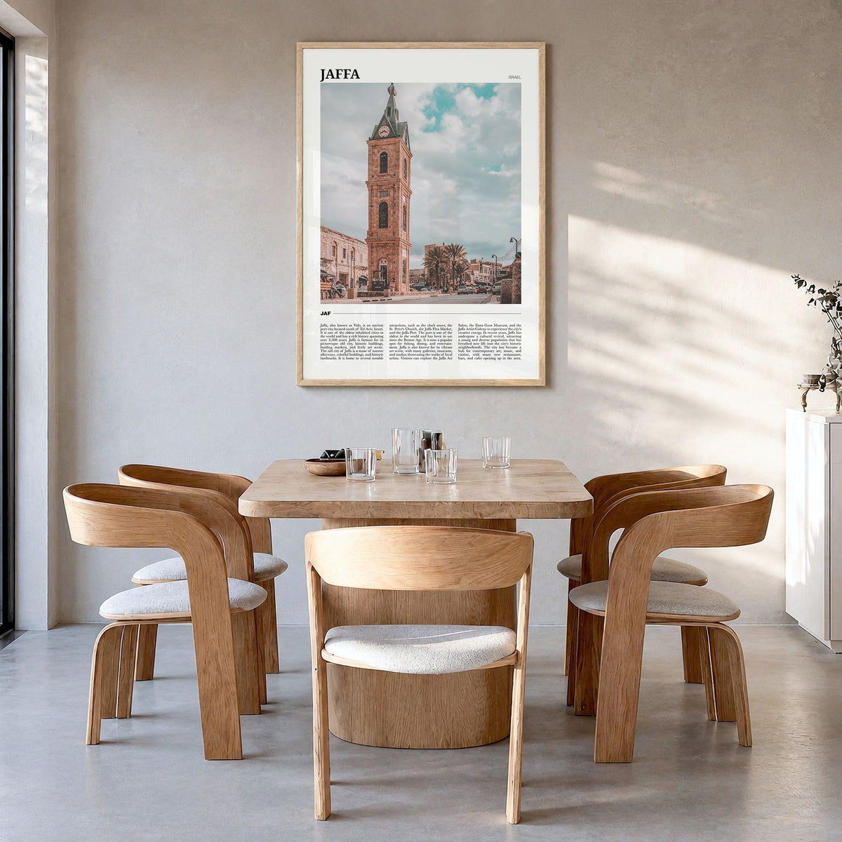 Jaffa Travel Poster in a natural wood frame, hanging in a dining room