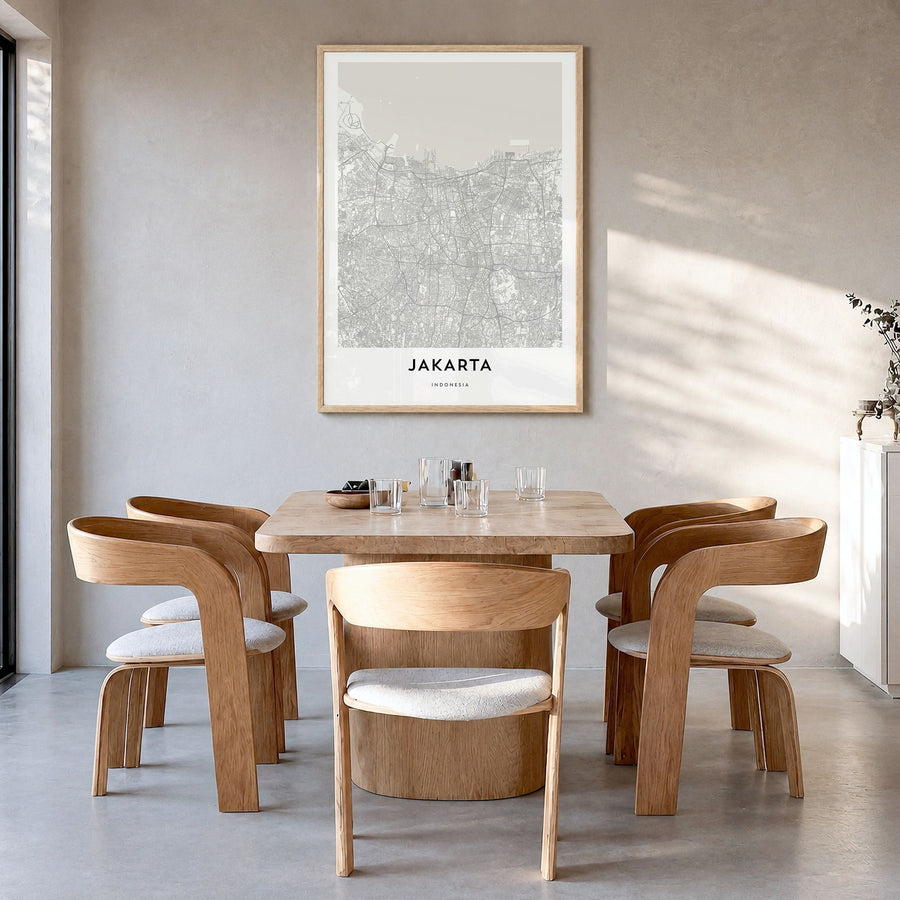 Jakarta Map Poster in a natural wood frame, hanging in a dining room