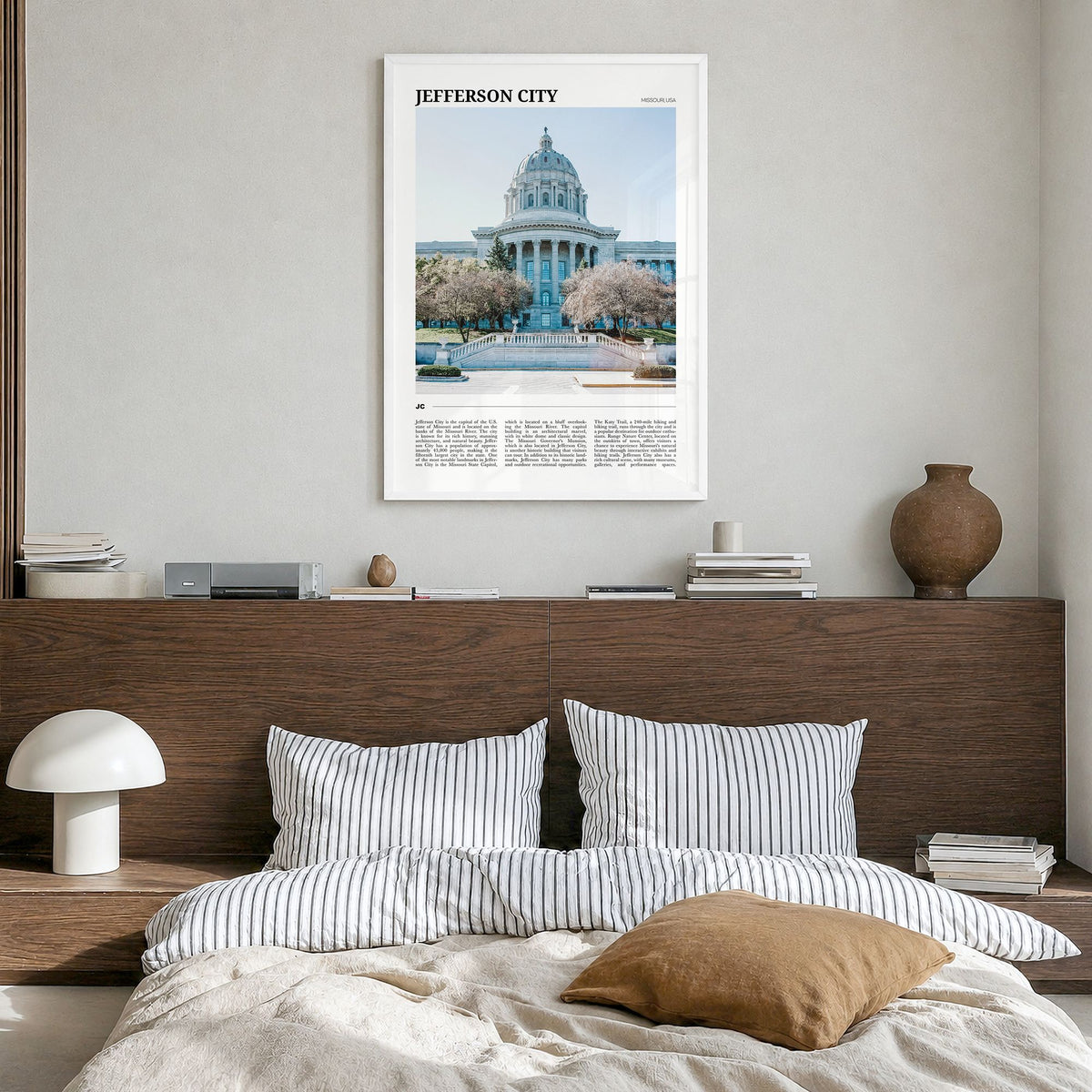 Jefferson City Travel No 2 Poster in a white wood frame, hanging in a bedroom