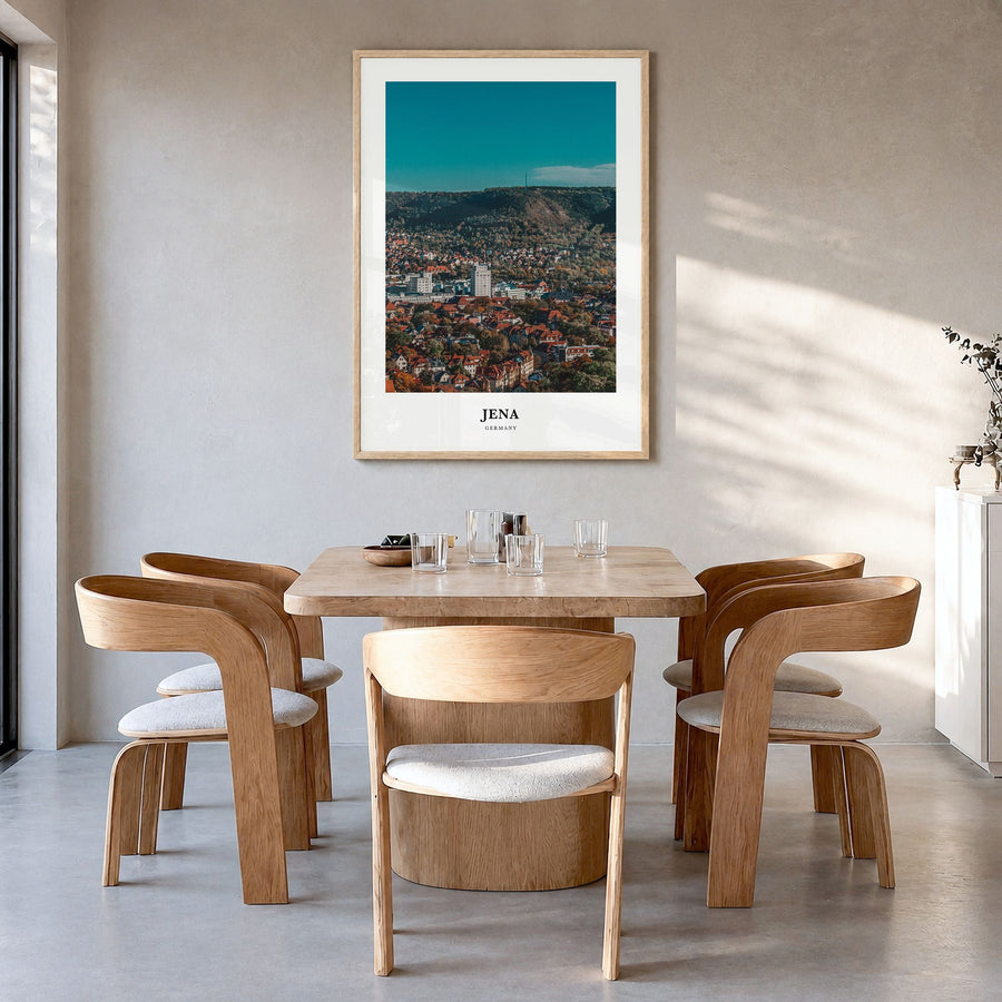 Jena Classic Poster in a natural wood frame, hanging in a dining room