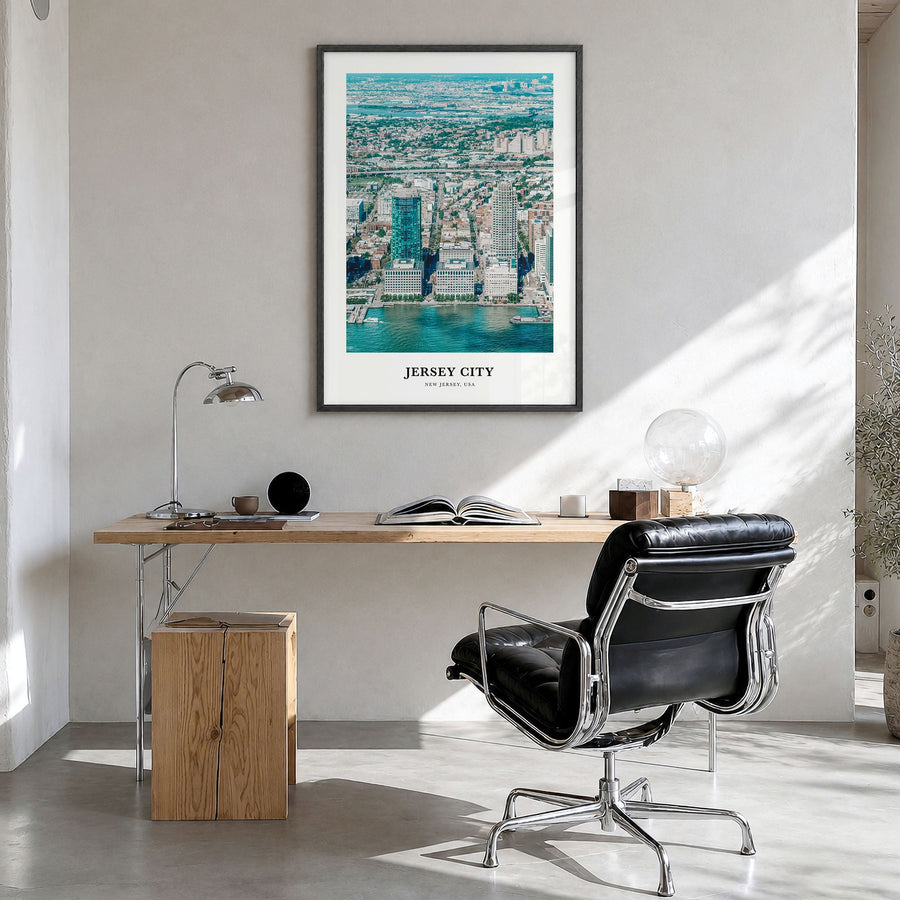 Jersey City Classic Poster in a black wood frame, hanging in a bright home office