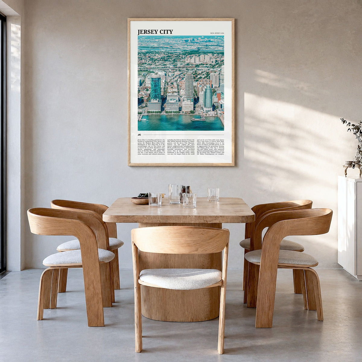 Jersey City Travel Poster in a natural wood frame, hanging in a dining room
