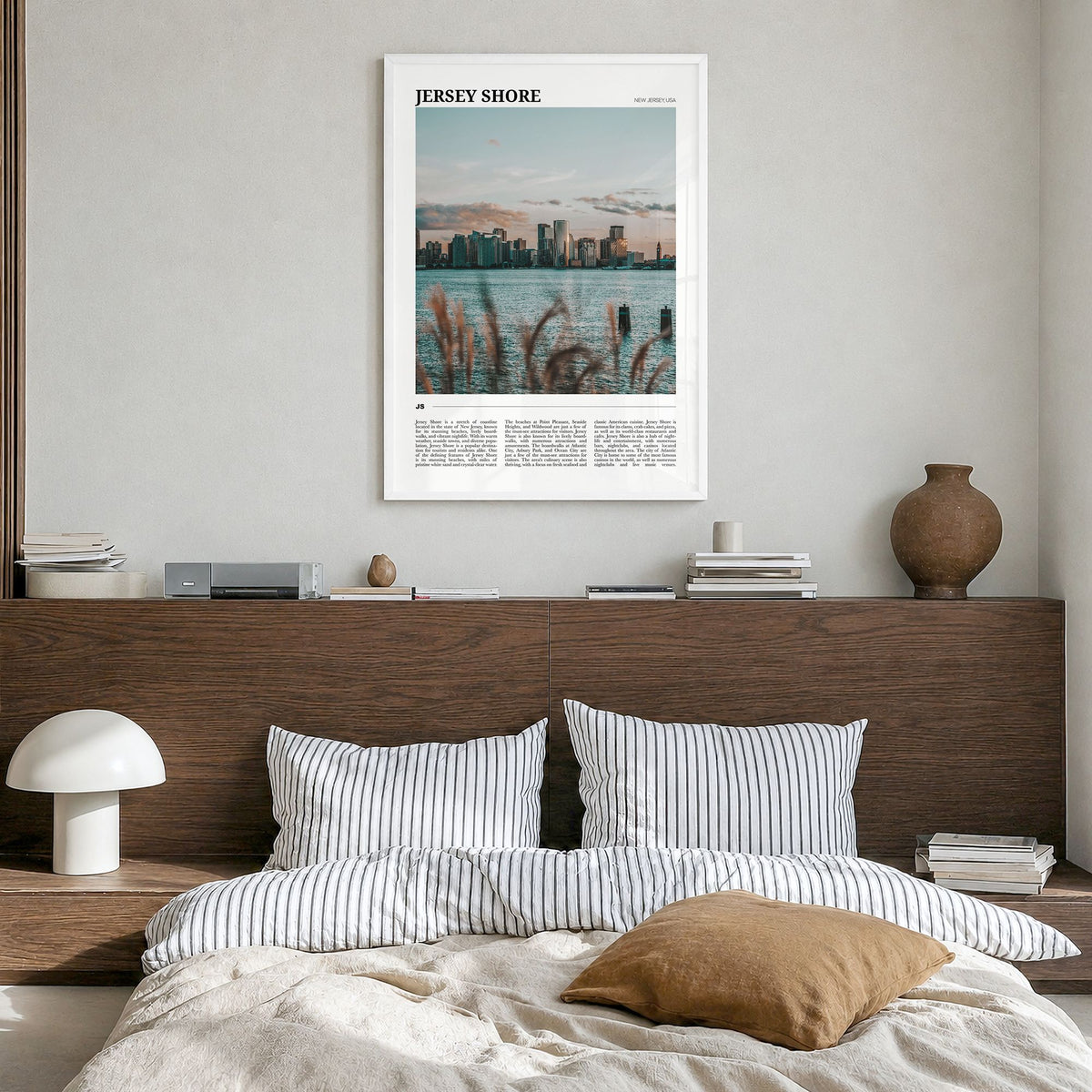 Jersey Shore Travel Poster in a white wood frame, hanging in a bedroom