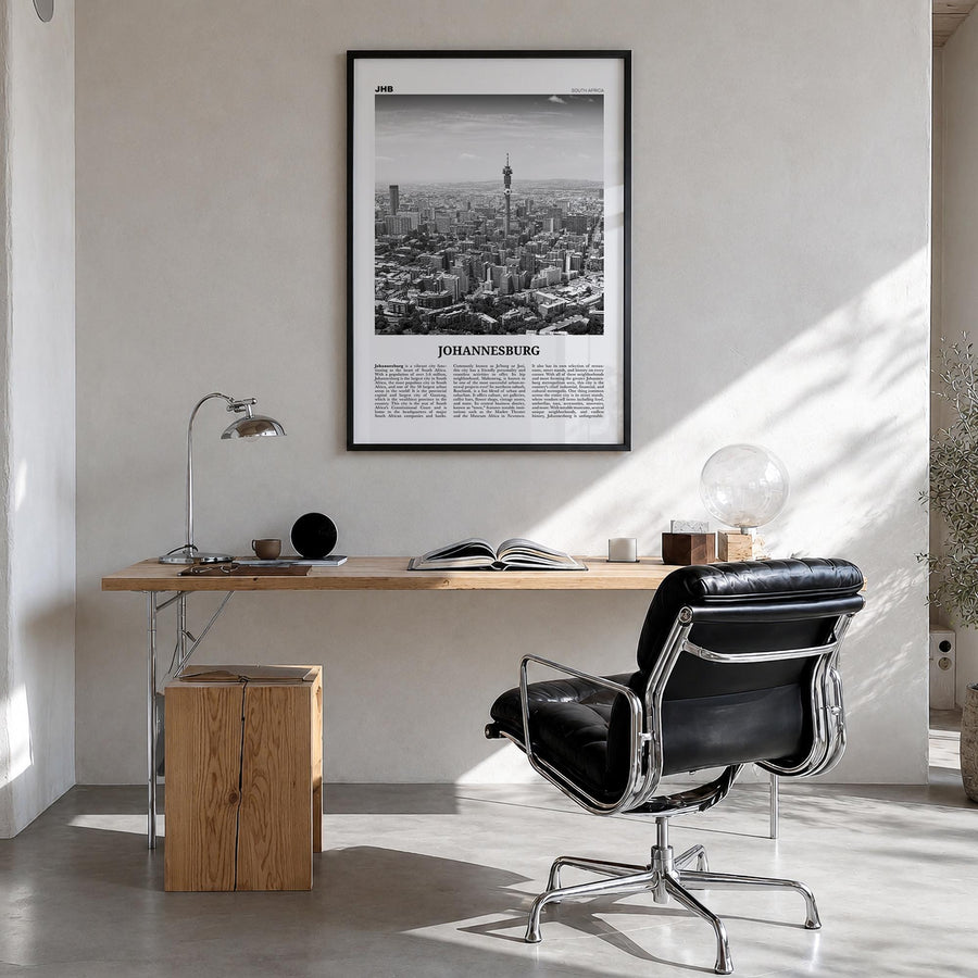 Johannesburg no. 1 black & white newspaper poster of South Africa – vertical wall art in black wood frame, hanging on wall