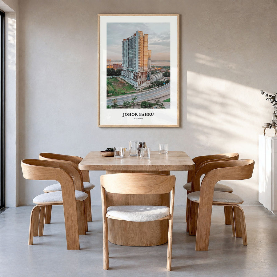 Johor Bahru Classic Poster in a natural wood frame, hanging in a dining room